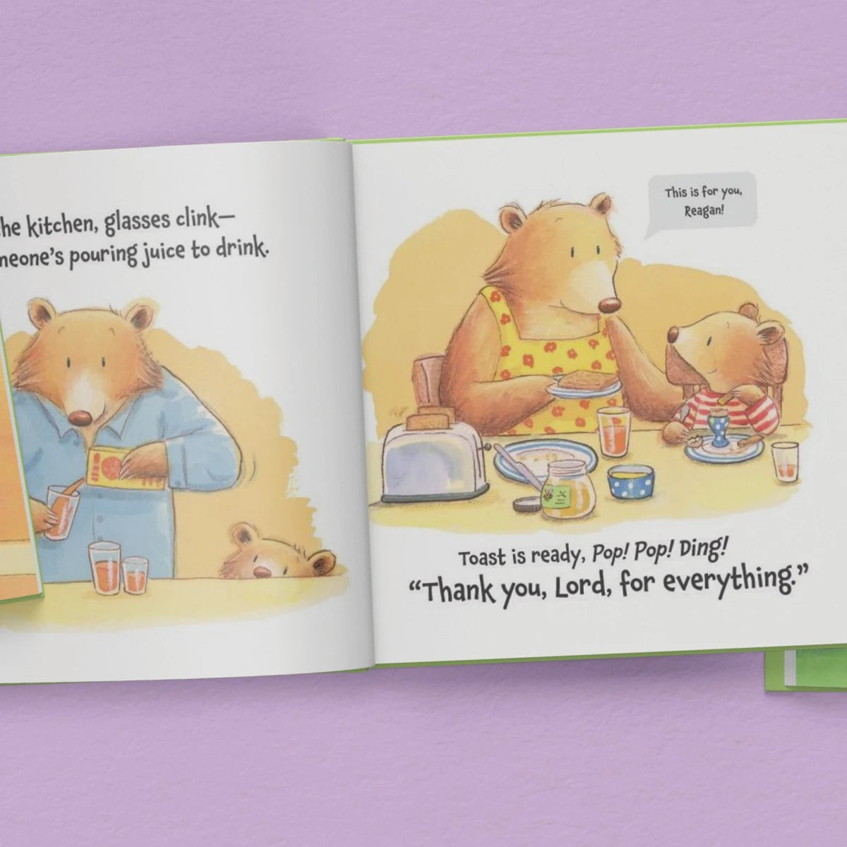 Illustrated book open to a page with bears in a kitchen setting on a purple background
