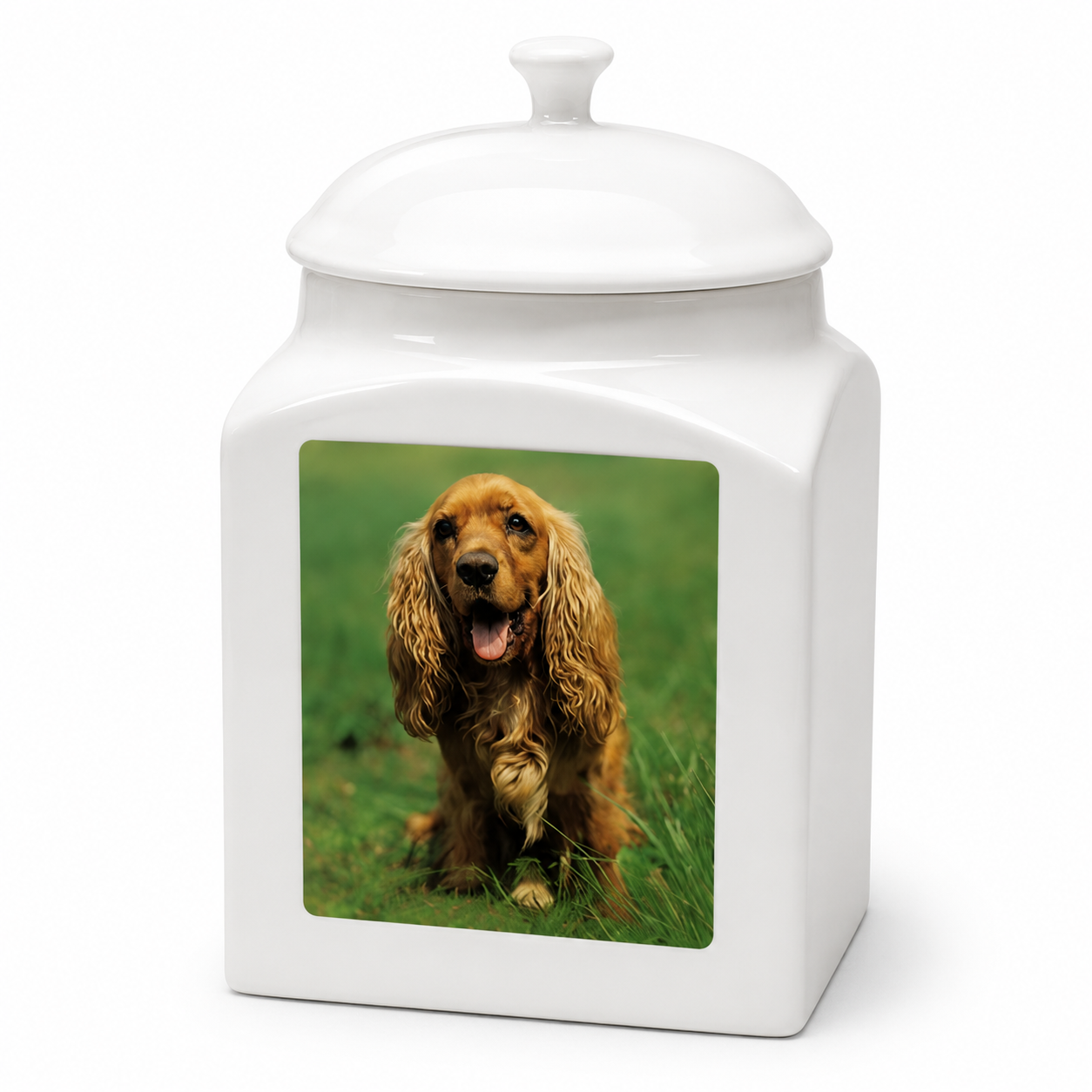 White ceramic jar with a lid featuring a picture of a dog on a grassy background