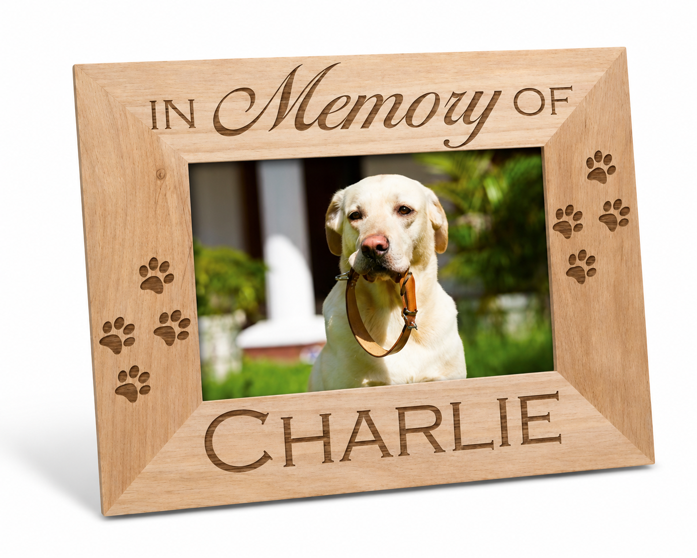 Wooden photo frame with 'In Memory of Charlie' engraving, featuring a dog holding a ball.
