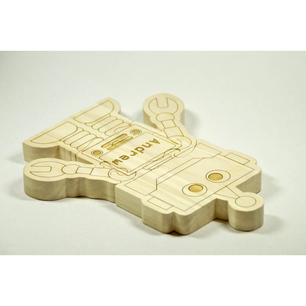 Wooden toy robot with 'Andrey' branding on a light gray background